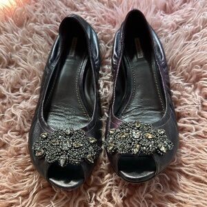 Vera Wang 
Lavender, Plum metallic leather, Rhinestone appliqué slide.